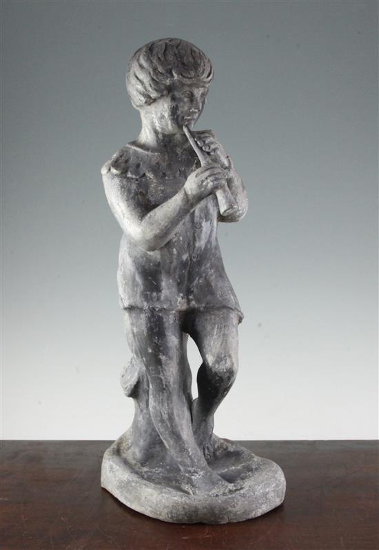 A 20th century lead garden figure modelled as a boy playing a pipe, 22in.